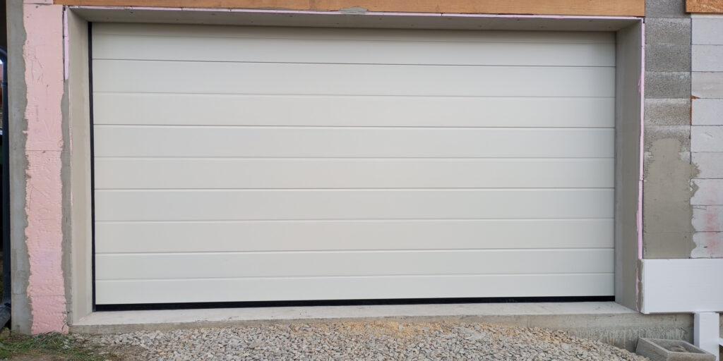 we successfully delivered a fully automated garage door for a client from Vinice. The client chose an elegant white finish in the AURORA design